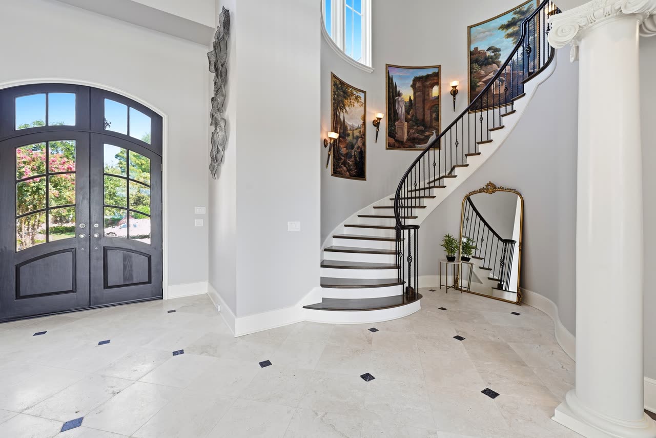 Entry foyer and the curved staircase