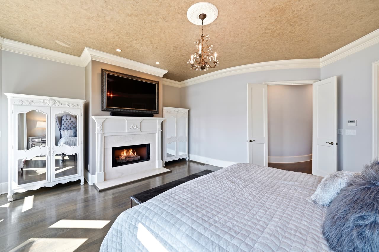 Primary bedroom and fireplace