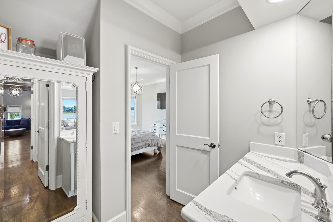 Guest bathroom and bedroom beyond